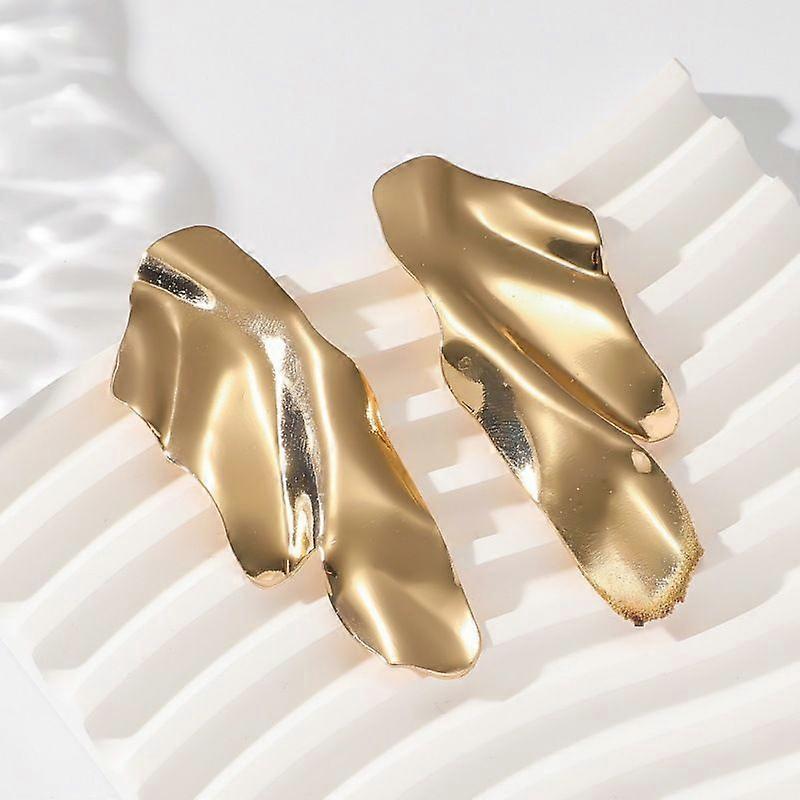 Street shot ins geometric metal earrings design photosensitive comma water drop earrings female gold 2