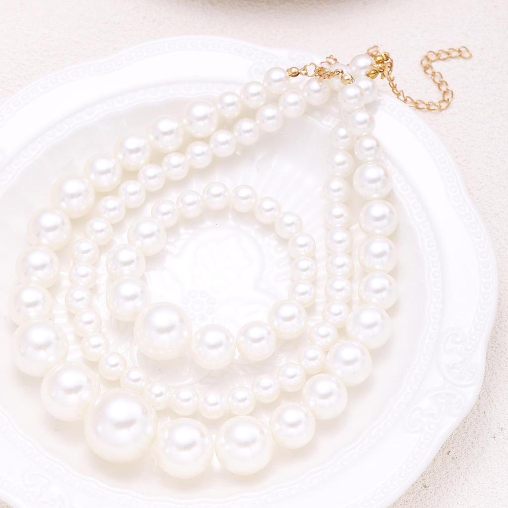 Смелый жемчужный чокер: Многослойное эффектное ожерелье для женщин