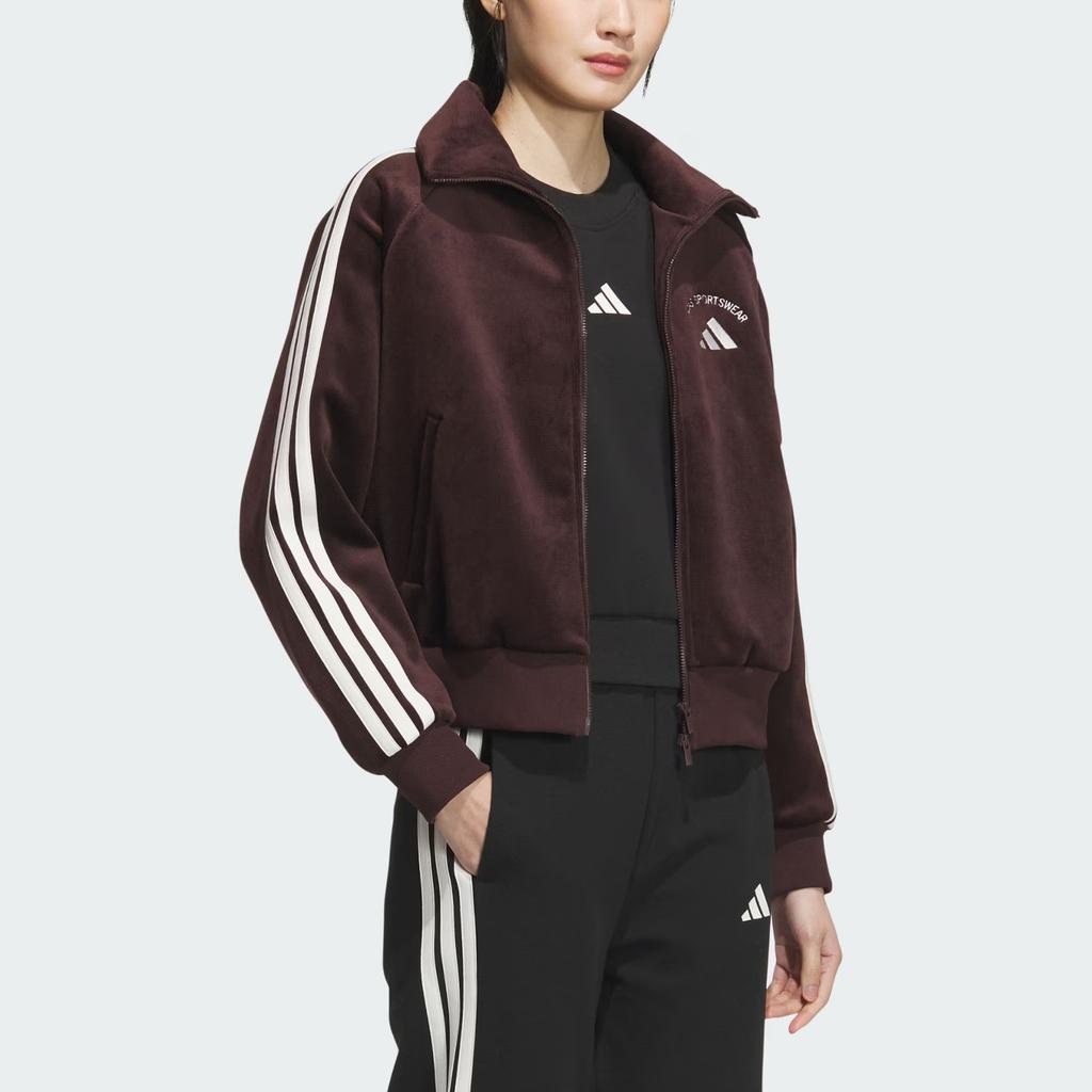 adidas Спортивная одежда Флисовая куртка с логотипом и надписью, теплая, свободного кроя, с коротким воротником-стойкой и рукавами реглан для женщин Куртка KC0035