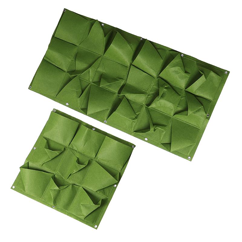 Зеленые вертикальные висячие цветочные горшки садового плантатора кладут в сумку подвес держателя стены