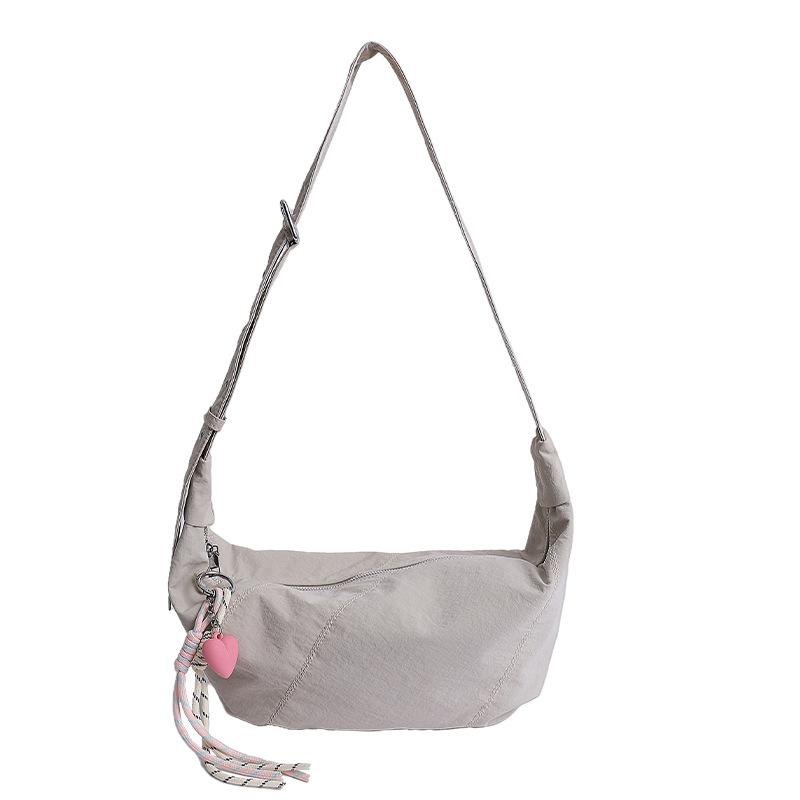 2025 summer new Korean version of casual street personality shoulder bag college students simple fashion dumplings messenger bag bag