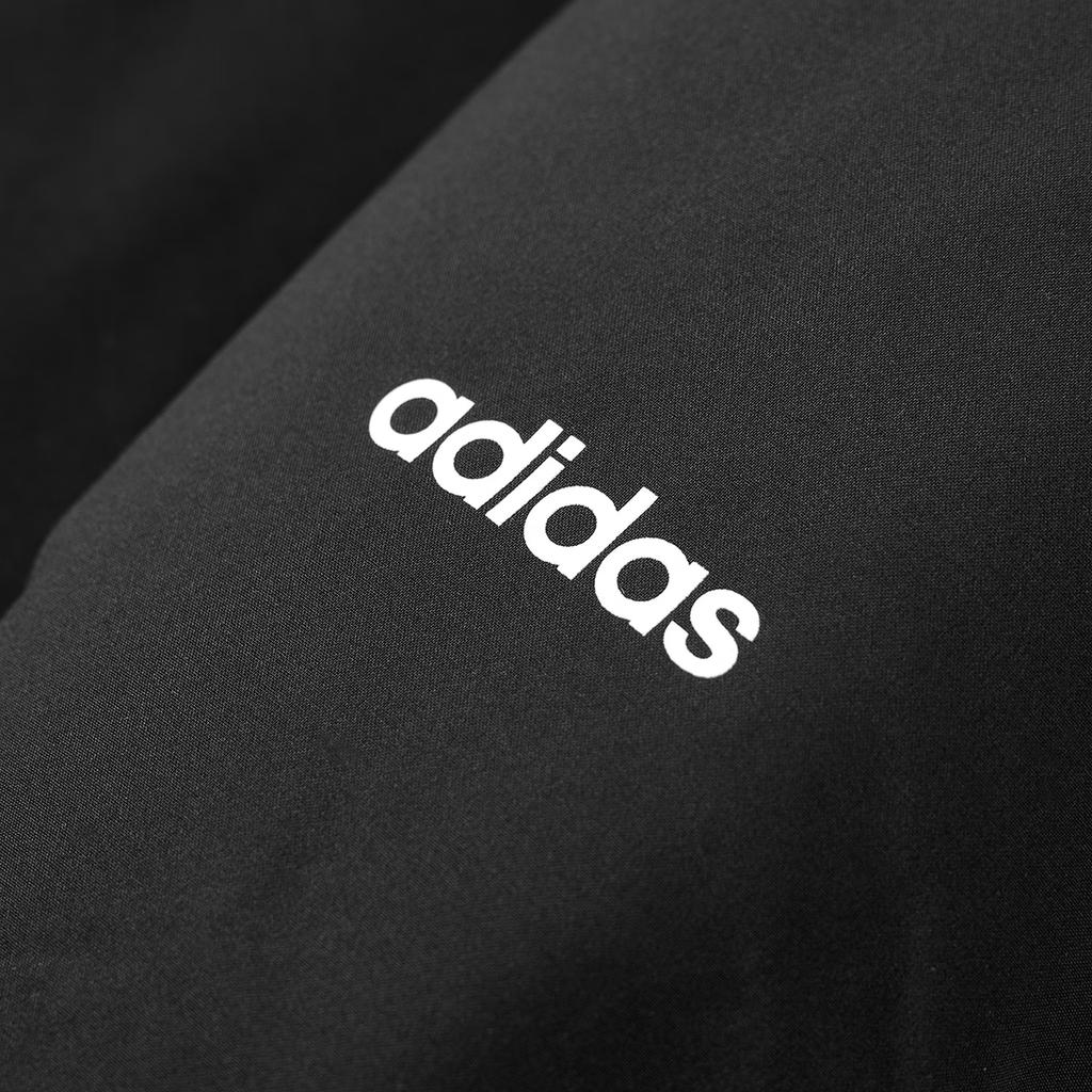 Adidas Ветрозащитная теплая куртка-пуховик с капюшоном и надписью «Унисекс» черная JL9616