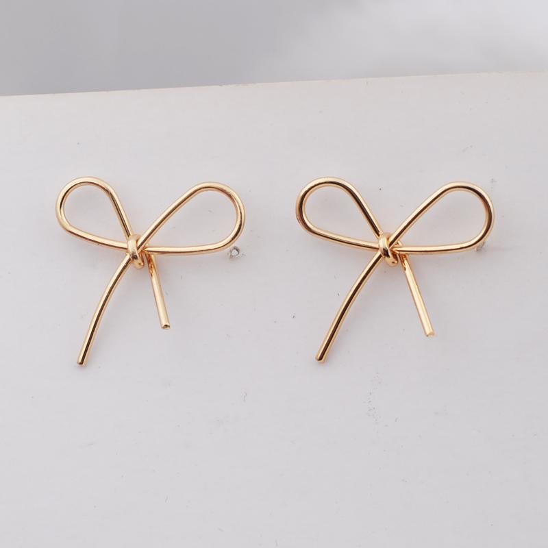 Girls Sweet Bow Knot Earrings Metal Hollow Out Golden Stud Earrings for Women Wedding Party Simple Jewelry Accessories