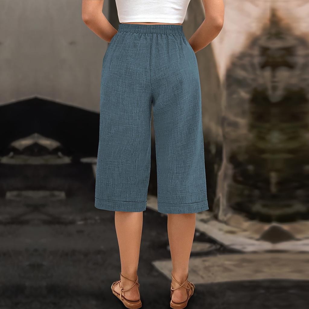 Новые женские укороченные брюки с простым подолом и элегантными деревянными пуговицами
