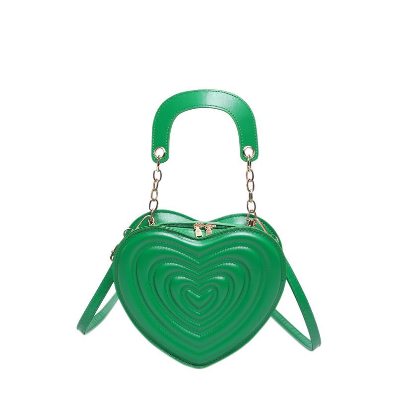 Сумка с углублениями 2024 года, новая модная сумка в форме сердца, милая модная сумка через плечо, однотонная сумка в форме сердца для девочек