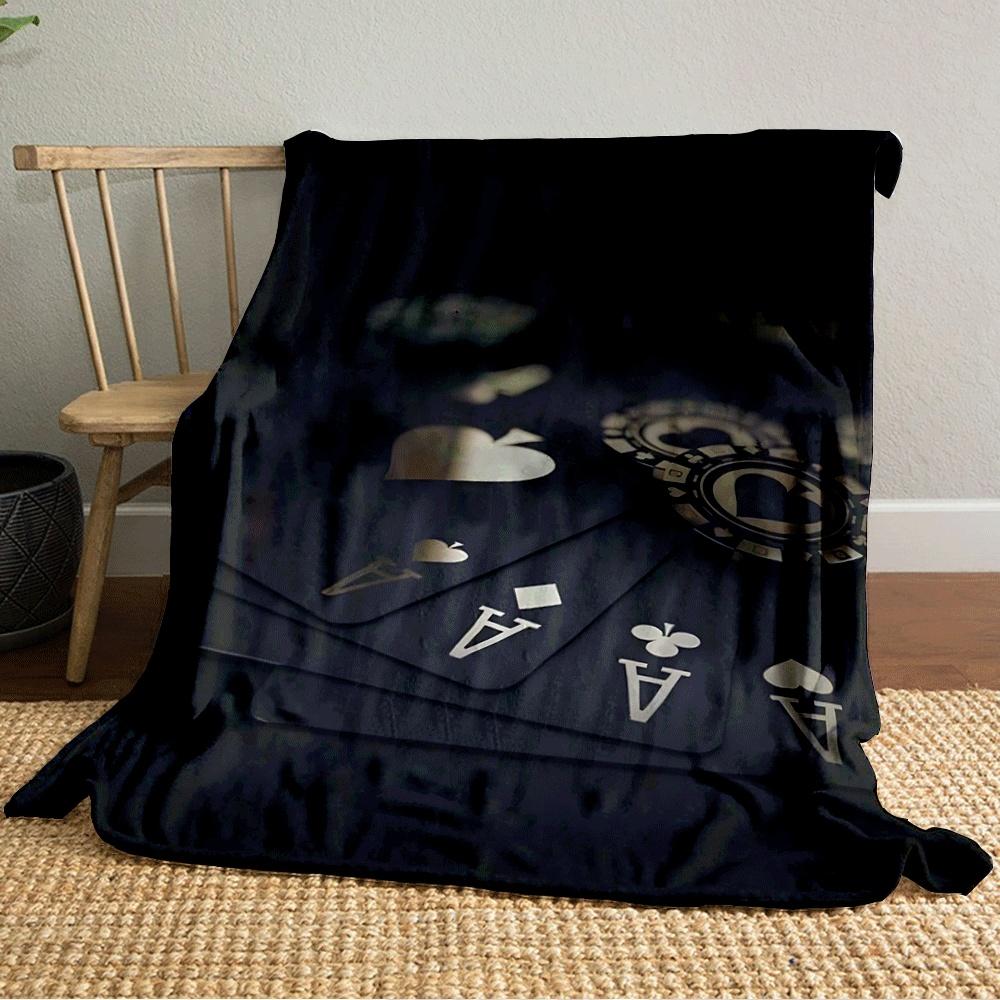 Black and gold playing cards and chips arranged in a neat, elegant layout. for all seasons blanket lunch break throw gift
