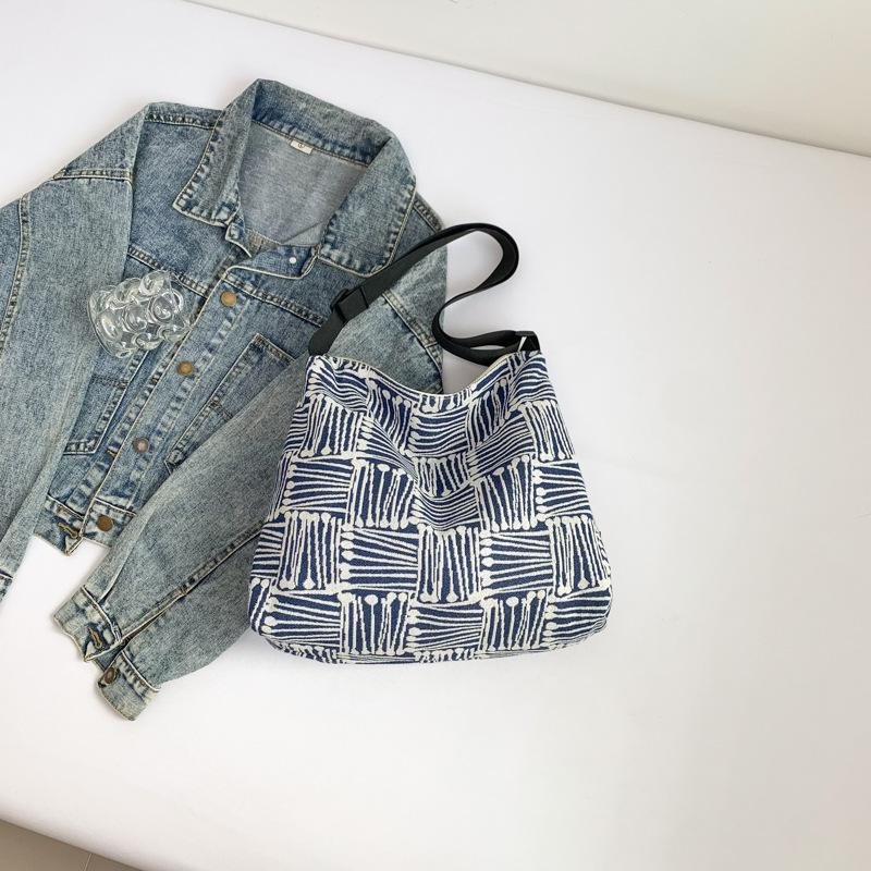 Тканевая сумка 2025 осень новая большая вместимость холст высокая ценность клетка широкий плечевой ремень одно плечо мессенджер сумка-тоут