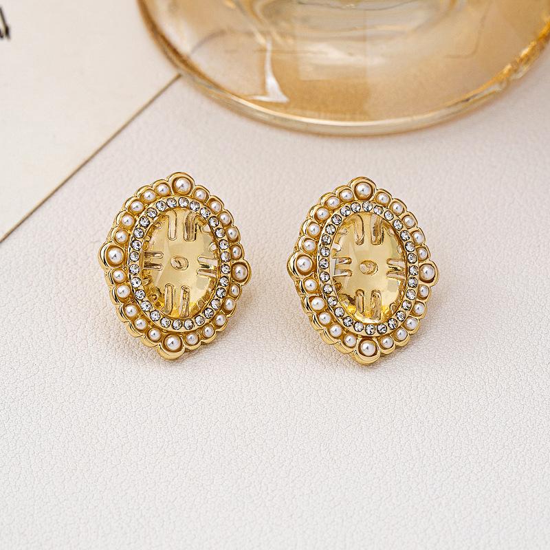 New S911 Silver Needle Earrings Retro Premium Texture Smart Cat's Eye Bead Earrings French Niche Design Earrings