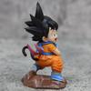 9cm Dragon Ball Kawaii Figurine Childhood Son Goku Hold Puaru Action Figures Anime Model Doll Collection Desktop Decoration Toy