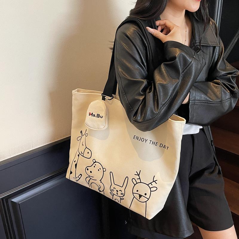 2025 Autumn New Leisure Commuter Large-capacity Canvas Bag Women's Niche Shoulder Bag Graffiti Portable Tote Bag