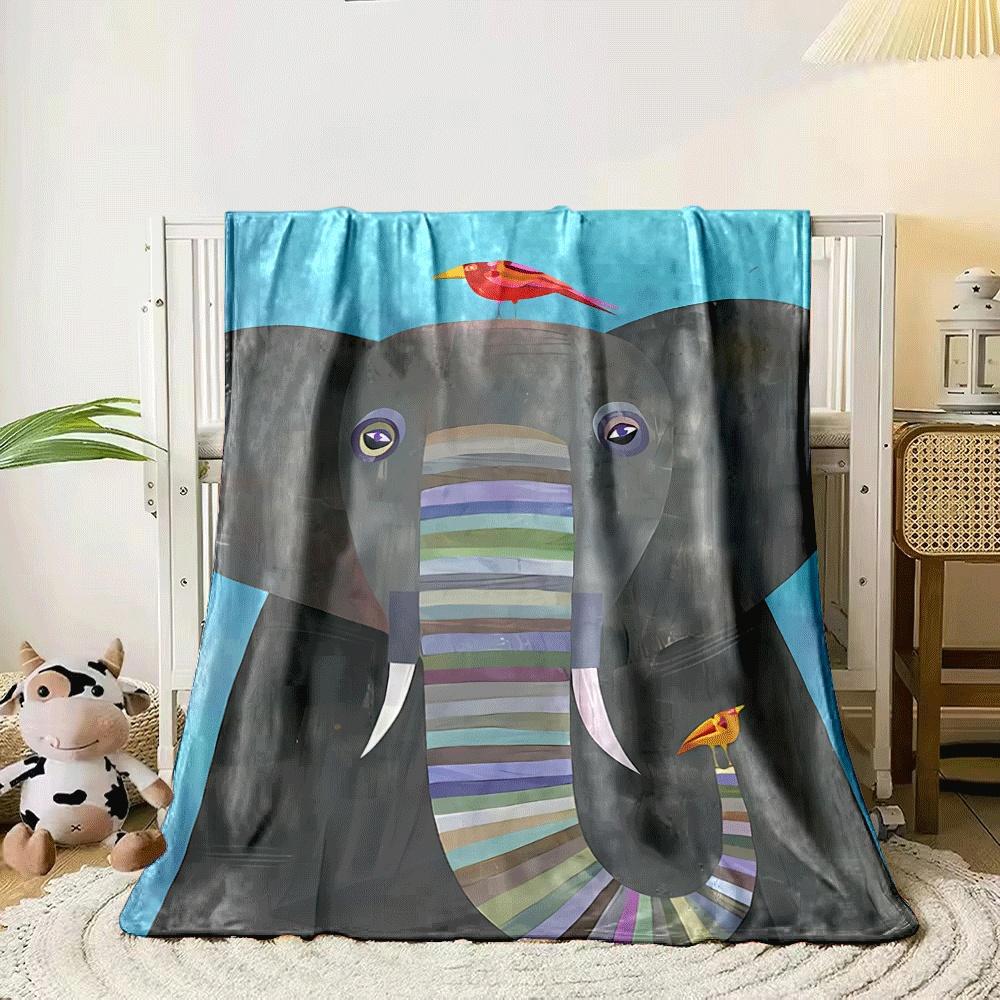A gray elephant with a multicolored striped trunk and two vibrant birds. for all seasons blanket lunch break throw gift