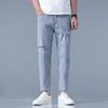 Новые мужские брюки длиной девять точек на весну и лето, приталенные, рваные, тонкие, с зауженным низом, корейская версия, брюки длиной 9 точек