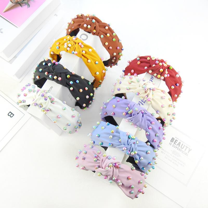 Весна и лето цветной жемчужный узел давление повязка на голову мода уличный снимок широкий край девушка тренд повязка на голову