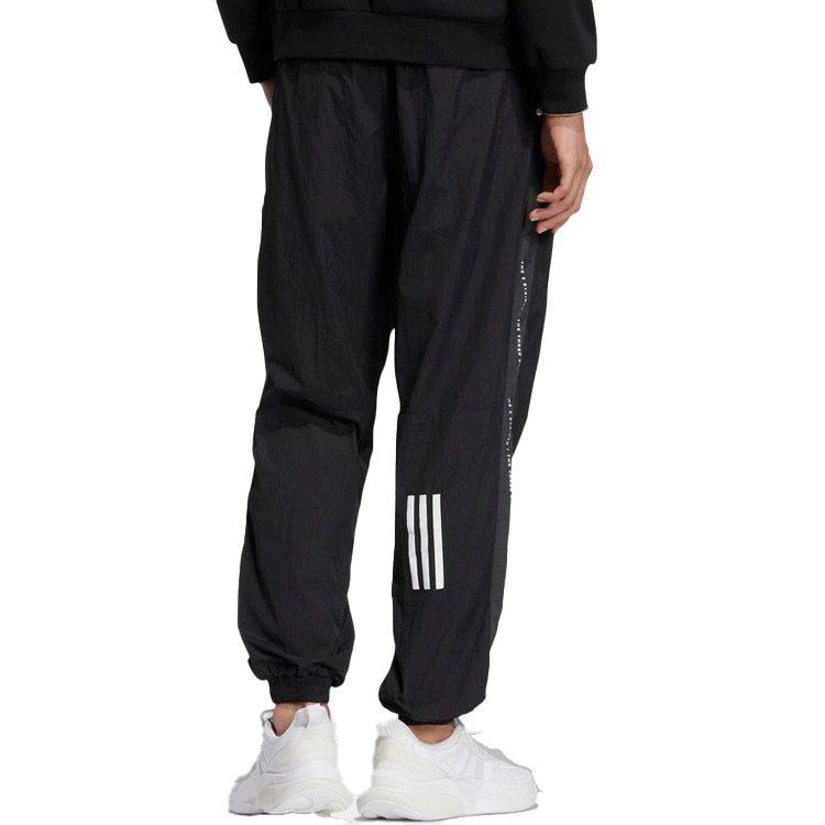 adidas Повседневные брюки унисекс черные с умеренной манжетой IA9422