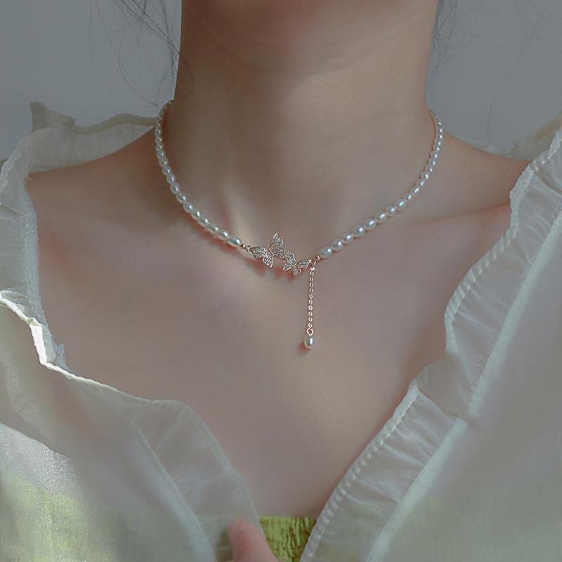 Butterfly pearl necklace women's pendant niche design retro high-end temperament collarbone chain neck chain tide