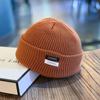 Мягкая шерстяная нить Вязаная шапка Защита ушей Вязаная шапка Модная шапка-пуловер Женская Мужская