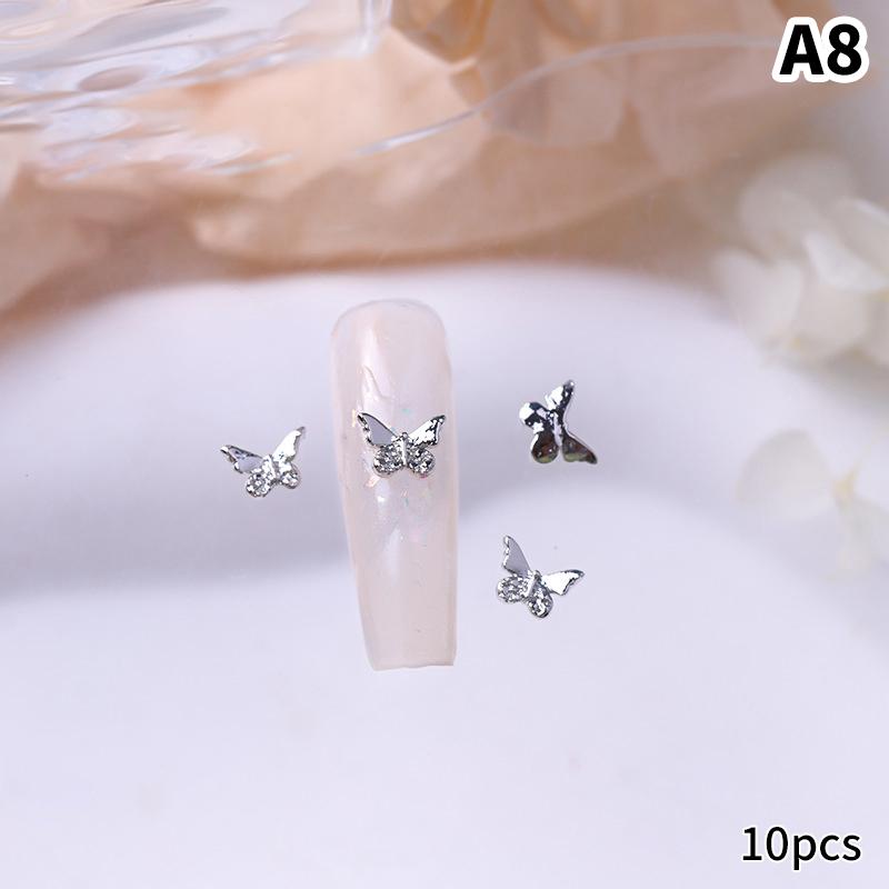 10 шт./пакет в форме бабочки, звезда, цветок, подвеска для ногтей, серебряный сплав для ногтей, жемчужные украшения, аксессуары, принадлежности для ногтей
