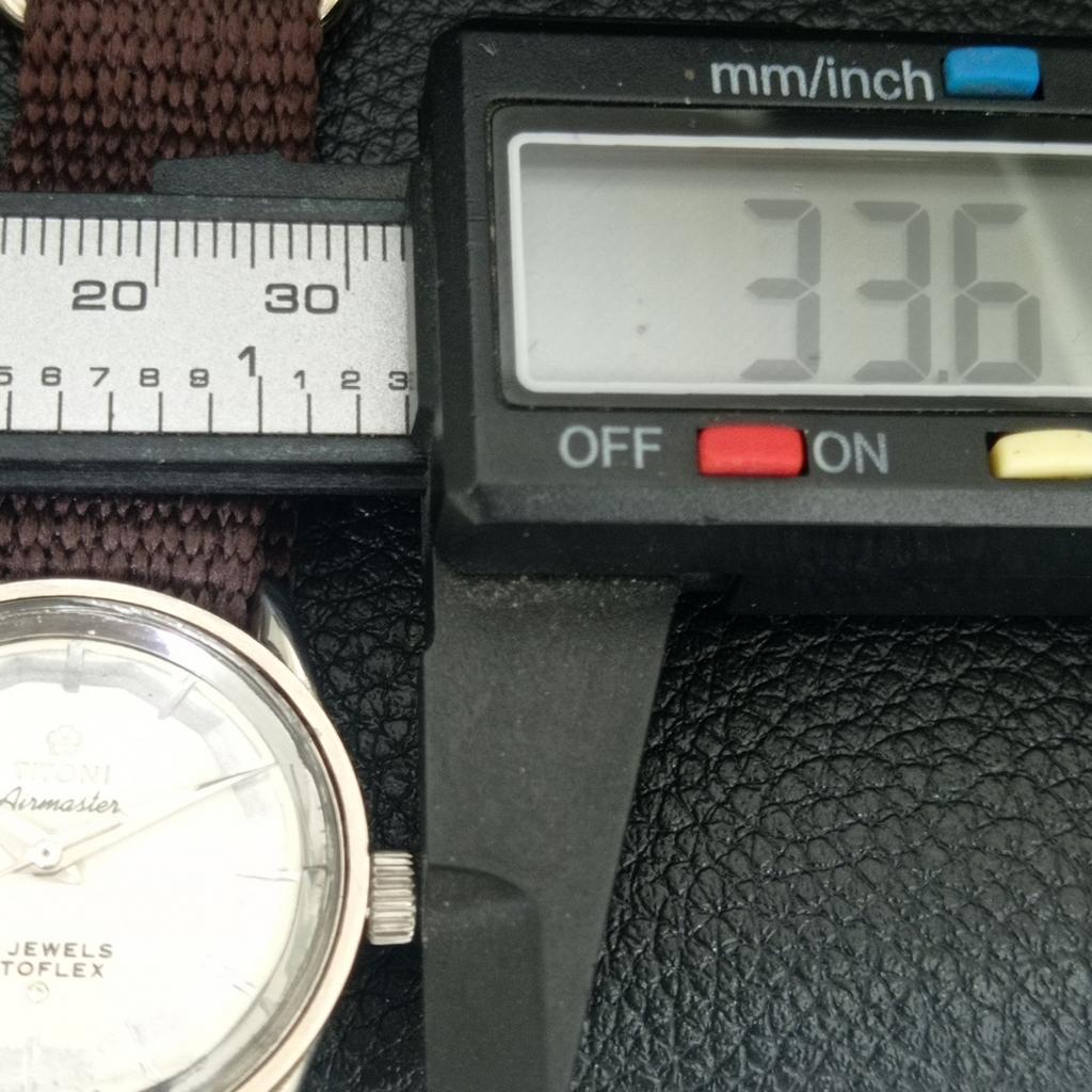 Titoni AIRMASTER TITOFLEX ВИНТАЖНЫЕ МЕХАНИЧЕСКИЕ ШВЕЙЦАРСКИЕ МУЖСКИЕ БЕЛЫЕ ЧАСЫ a703208-1