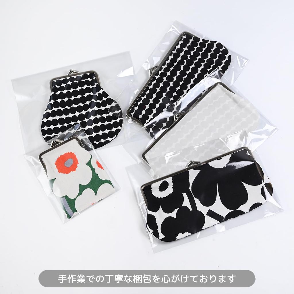 Marimekko Tiise Mini Unikko cosmetic bag in white and black (Russie Mat) (047245-190), a cute, Nordic design. [Parallel Import]