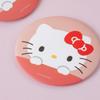 Круглое ручное зеркало Hello Kitty розового цвета