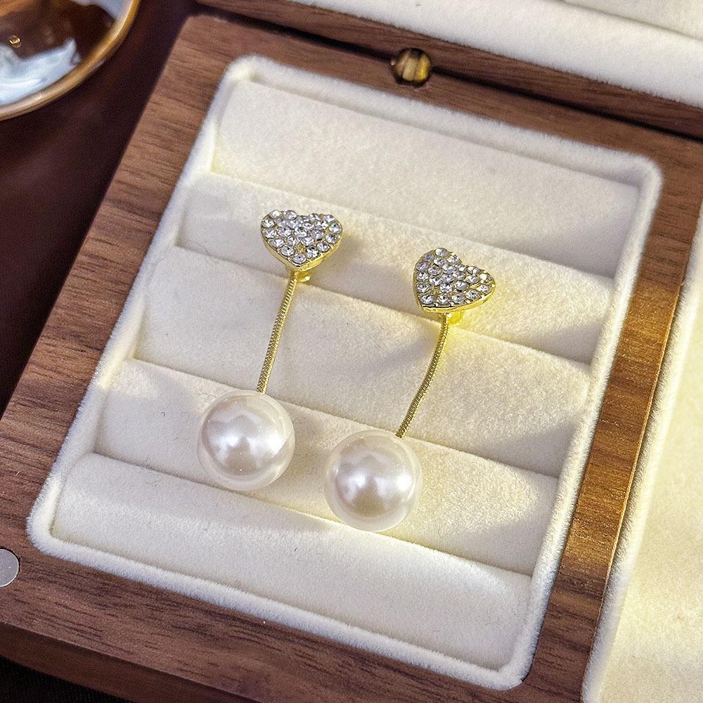 «Серьги-бантики из серебряных игл с жемчугом и цирконием»: Нишевый дизайн, стильный и универсальный, легкий роскошный аксессуар высокого класса.