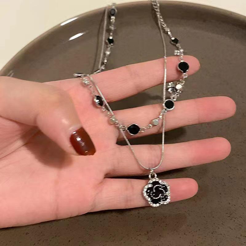 Double-Layer Rose Zircon Sweater Necklace: Elegant Summer Clavicle Chain, Women's Light Luxury High-End Accessory.