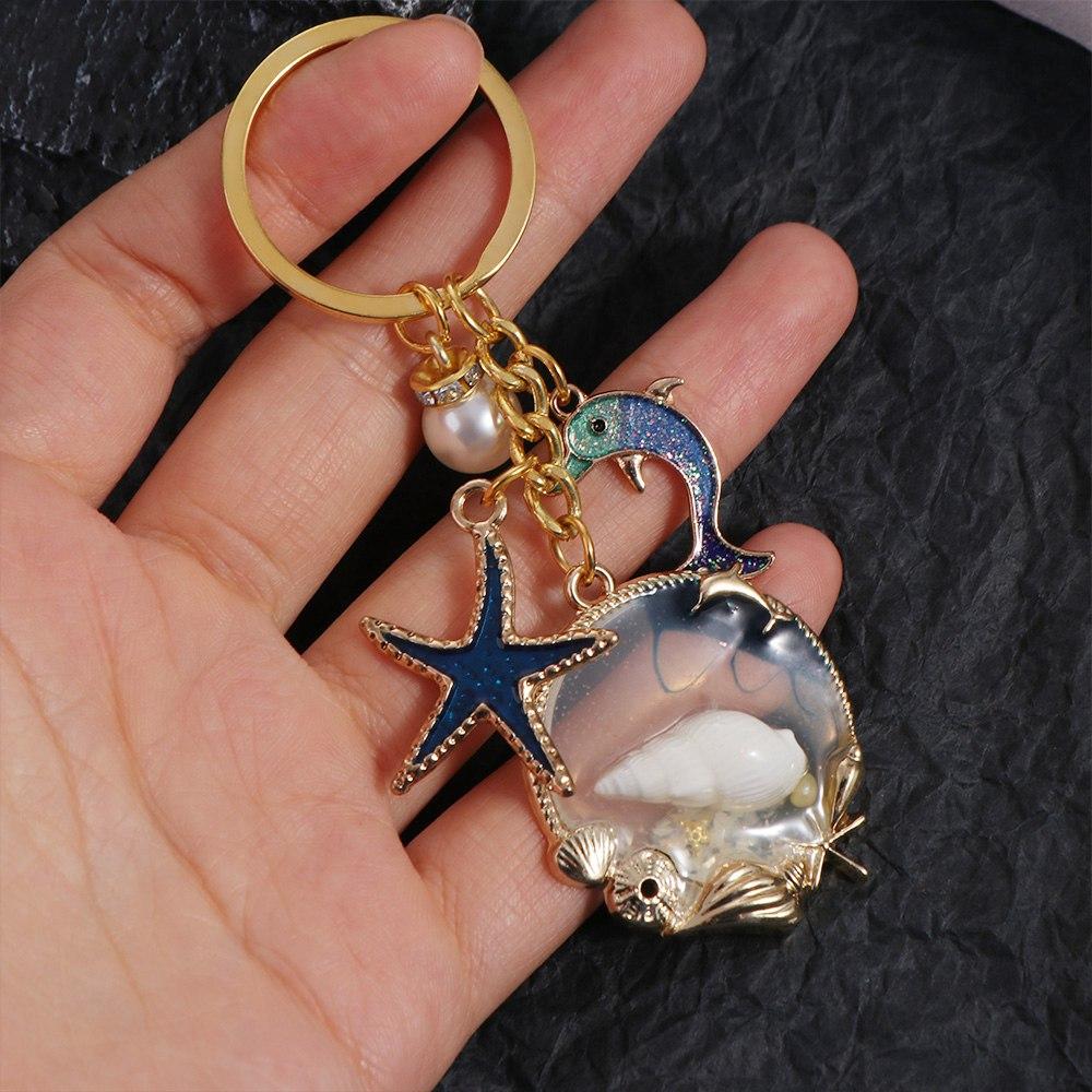 Брелок с жемчугом и дельфином, модные подвески на морском пляже, новый брелок с ракушкой и звездой унисекс