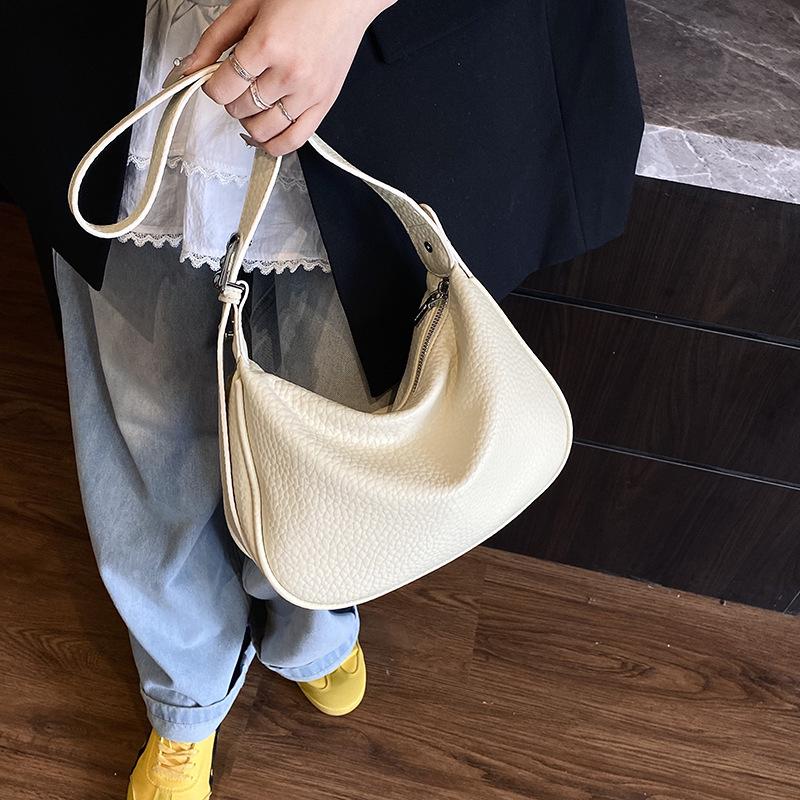 Супер огненная нишевая сумка-рожок женская 2025 новая весна и лето универсальная сумка-мессенджер модная на плечо подмышку сумка-пельмень