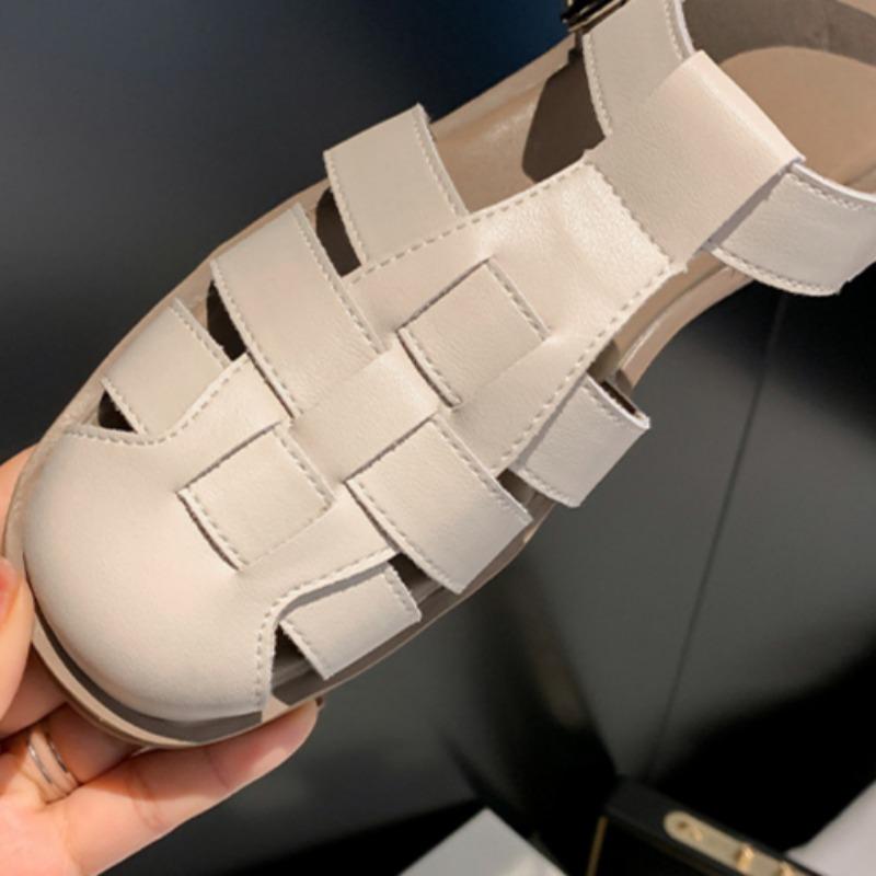 Ретро плетеные римские сандалии Мягкая подошва Ниша Толстая подошва Низкий каблук Полые свиные клетки Туфли из натуральной кожи Женские туфли