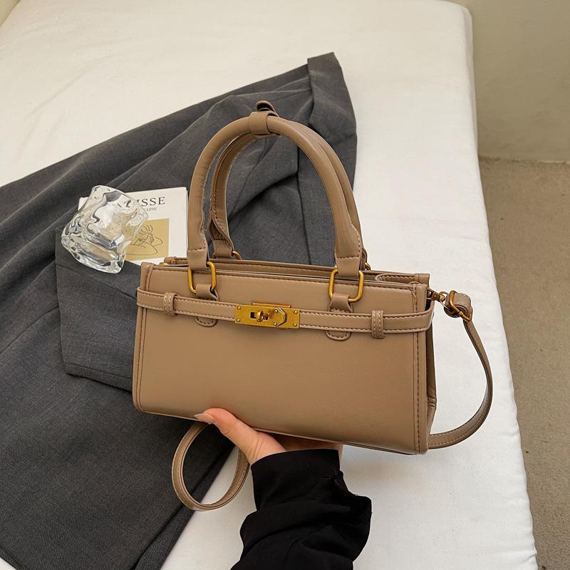 Корейская версия простой и универсальной нишевой портативной сумки-мессенджера для поездок на работу, женская, новая коллекция осень-зима 2025, высококачественная текстурированная сумка-тоут