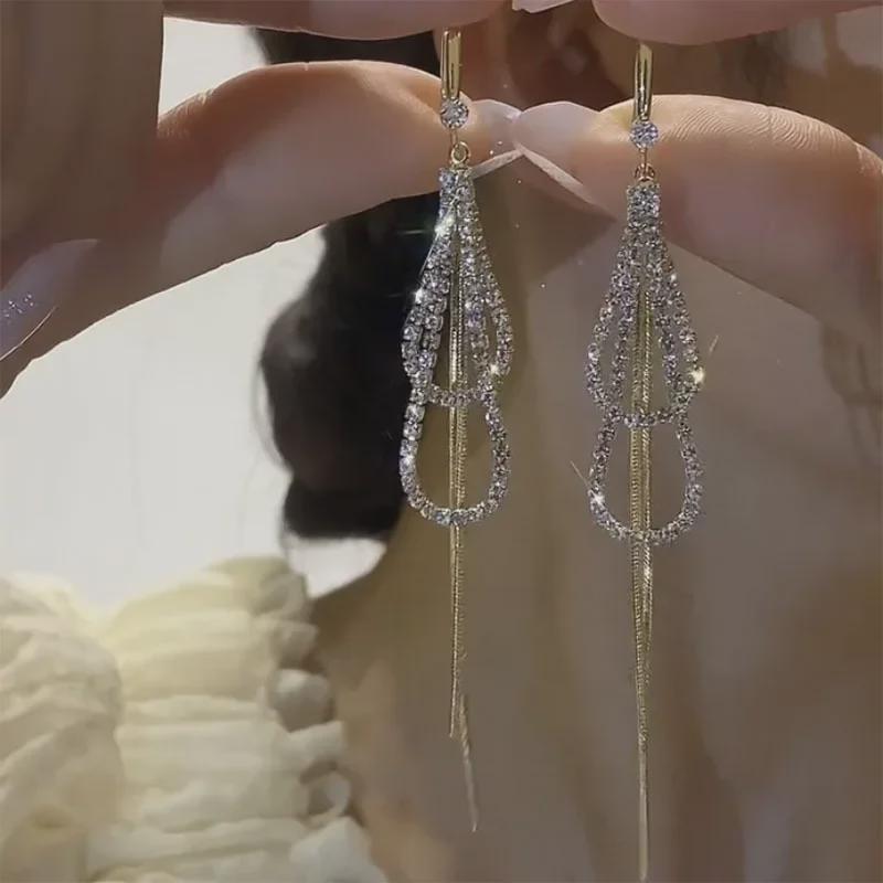 Элегантные двухслойные серьги-кисточки в форме капли воды — уникальный дизайн для создания эффекта стройности лица