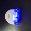 Qiao Qiang Mini Whitening Tooth Lamp: Portable Cold Light Device with Gel for Teeth Whitening, In White or Blue.
