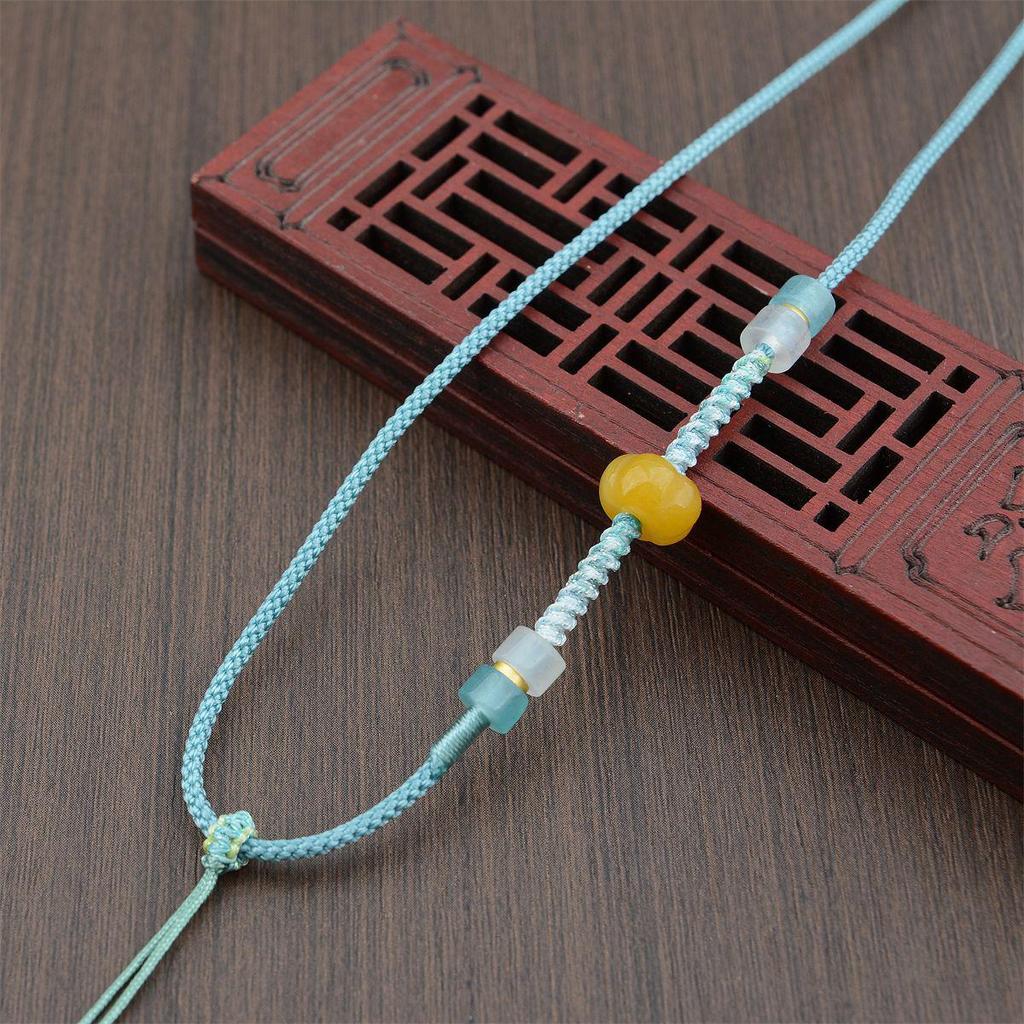 Плетеное макраме ожерелье с кристаллом авантюрина и подвеской из тыквенного нефрита