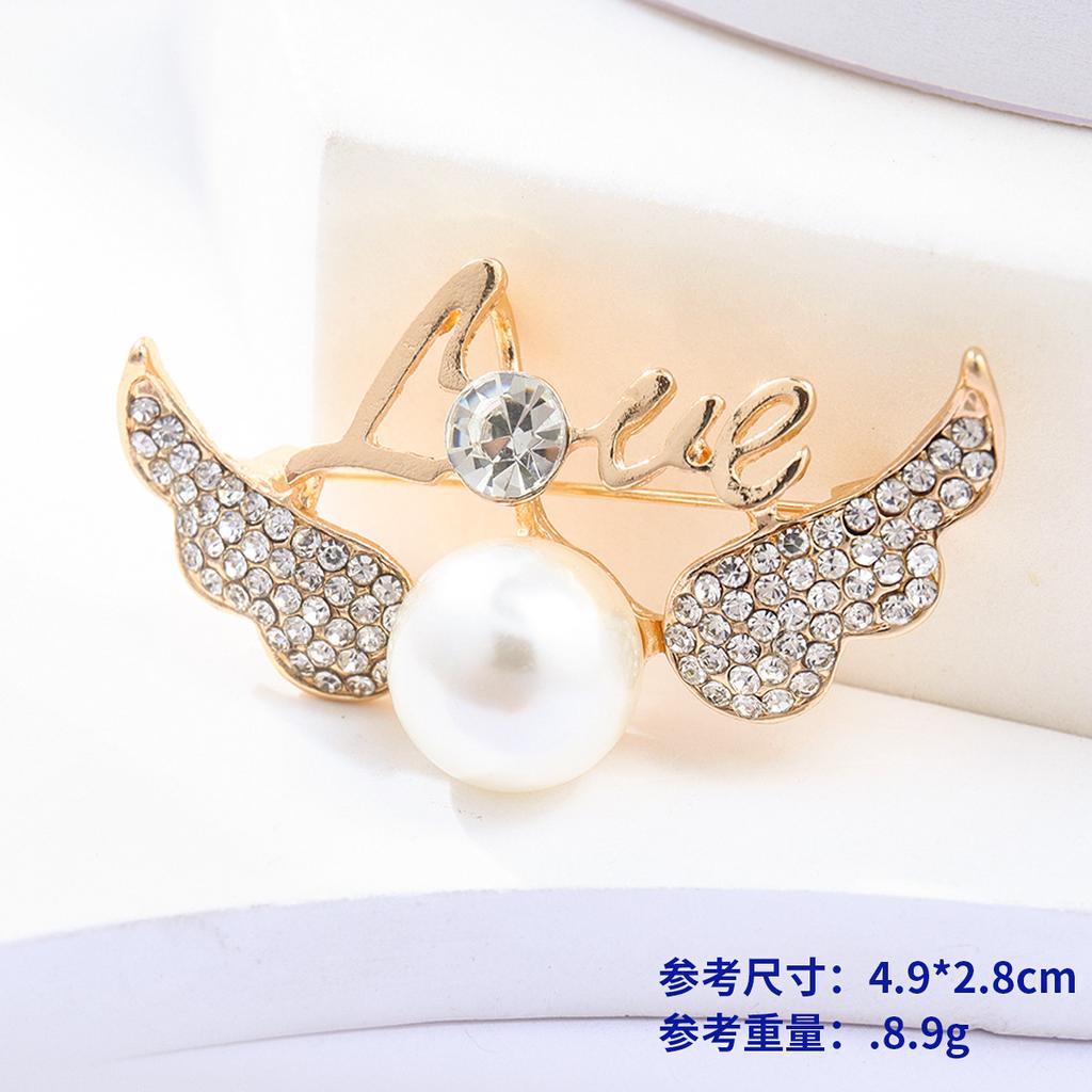 Винтажная модная брошь Niche High-End Sense Rhinestone Персонализированная сплавная корона Корсаж Бант Булавка Аксессуары