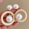 Chic Exaggerated Design Earrings Minimalist Hollow Wood Round Pearl Pendant Personality Niche Unique Versatile Fashion Studs