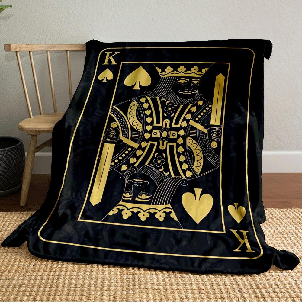 A golden King of Spades card design on a dark ornate background. for all seasons blanket lunch break throw gift