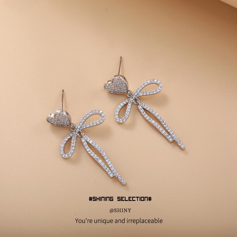Shining Pearl Heart Bow Earrings: Women’s Korean Style with High-End Elegance and Personality