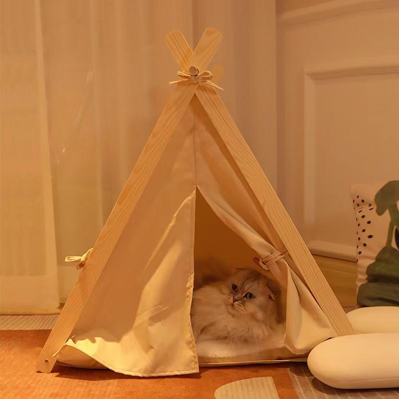 Spoil Your Pet with This Solid Wood Teepee Tent and Removable Canvas Cover.