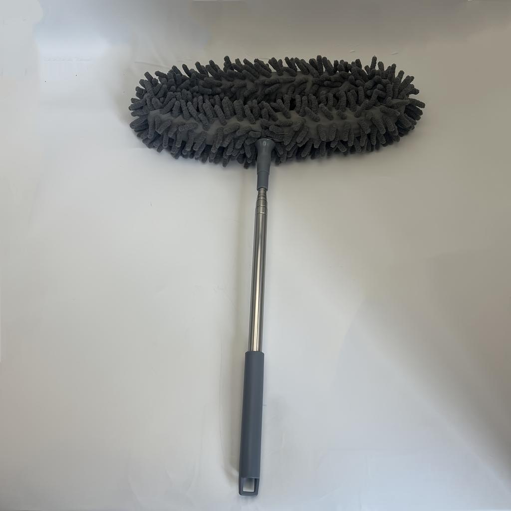 Retractable cleaning brush