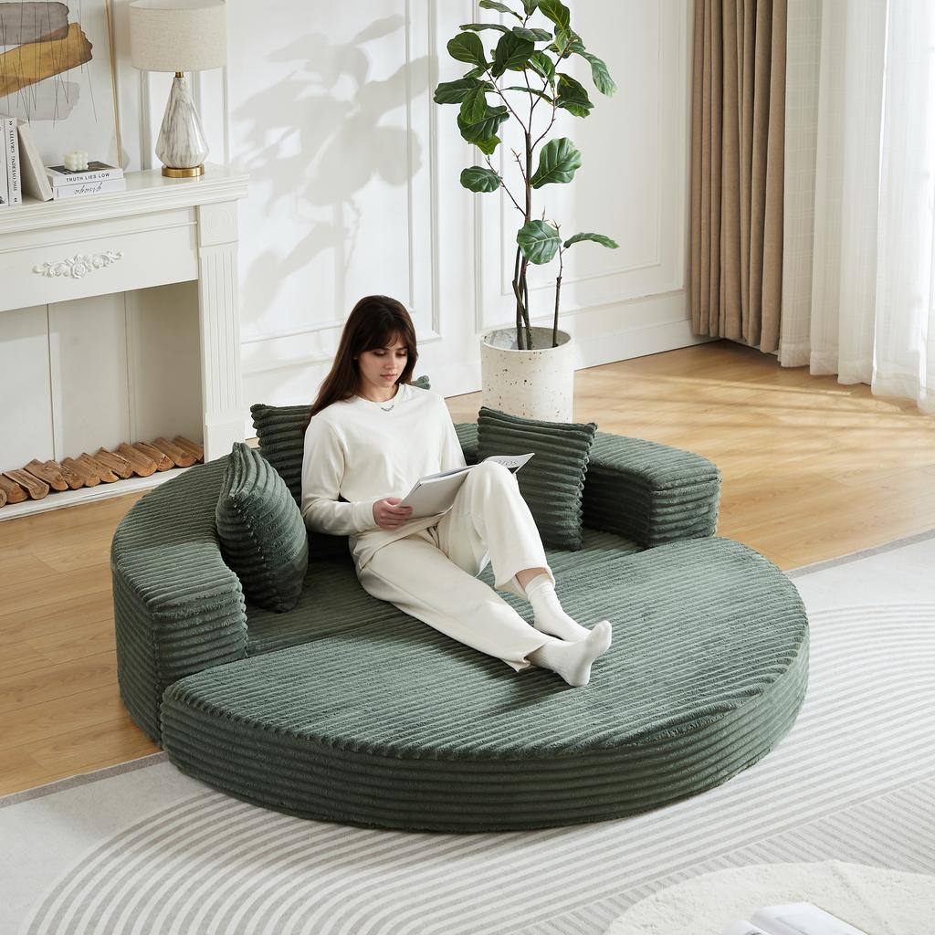 A versatile two-in-one sofa bed, which can be used both as a semi-circular sofa and as a round daybed. The armrests have fabric pockets