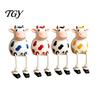 Cow Figurine Resin Statue, Cute Shelf Sitter with Dangling Rope Legs, Garden Decor for Patio Cartoon Farmhouse Animal Ornament Fence Railing, Planter,