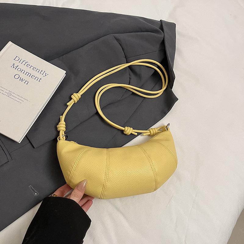 Французская нишевая сумка женская 2025 новая высококлассная на плечо сумка-мессенджер популярная весенне-летняя универсальная сумка-пельмень круассан
