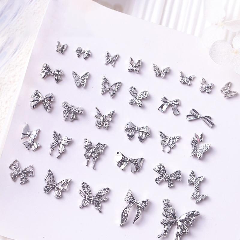 10 шт./пакет в форме бабочки, звезда, цветок, подвеска для ногтей, серебряный сплав для ногтей, жемчужные украшения, аксессуары, принадлежности для ногтей