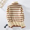 Женский вязаный свитер-пуловер на осень и зиму с контрастными полосками и свободными разрезами. Водолазки