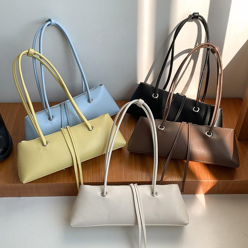 2025 Cross-border New French Pure Color Fashionable One-shoulder Bag Women's Niche Design High-end Armpit Stick