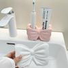 Visually Appealing Ceramic Toothbrush Holder with Bow Design Moisture-Resistant Bathroom Organizer, Freestanding Modern Vanity Decor for Countertop,