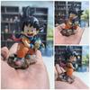Dragon Ball Merchandise: Chibi Goku Figure, Flying Nimbus, Childhood Goku Sitting Pose Holding Dragon Balls, Computer Case/car Figurine.