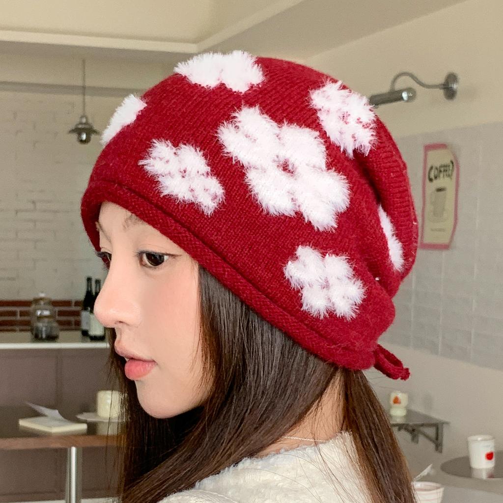 Autumn and winter knitted stacking hat women's Korean version of foreign style flower warm wool hat fashionable versatile drawstring cold hat tide
