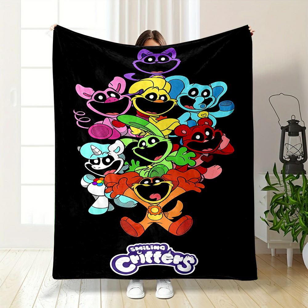 Colorful Smiling Critters On Black Background Patterned flannel blanket perfect for the bedroom living room, sofa, or a little nap