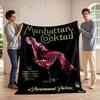 A woman in pink sits atop a cocktail glass on a black vintage poster. for all seasons blanket lunch break throw gift
